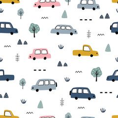 Seamless pattern with colorful vintage cars and small trees on a white background