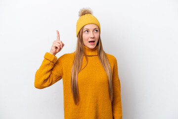 Young caucasian woman wearing winter jacket isolated on white background intending to realizes the solution while lifting a finger up