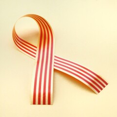 Obraz premium Senyera catalana flag ribbon on a yellow background. La diada catalana concept. Copy space to add text