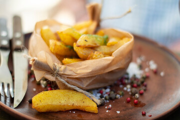 Fried potatoes with spices in a rural style