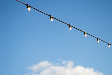Obraz premium Street lamps against the sky