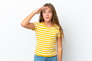Little caucasian girl isolated on white background has realized something and intending the solution