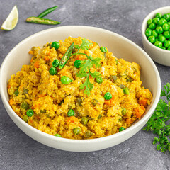 Bulgur Fried Rice with Green Peas and Lemon Garnished with Cilantro 
