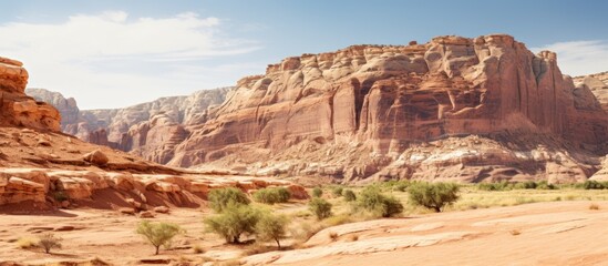 Fototapeta premium A desert rock formation shown on a white background with copy space image.