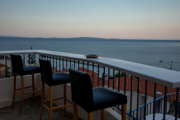 Amazing sea view from balcony in Tyros town, Peloponnese, Myrtoan Sea, GREECE in summer evening. 