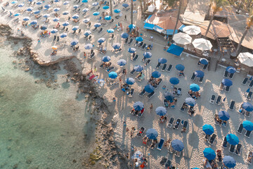 Bustling beach resort from above at sunset. Nissi beach, Ayia Napa, Cyprus
