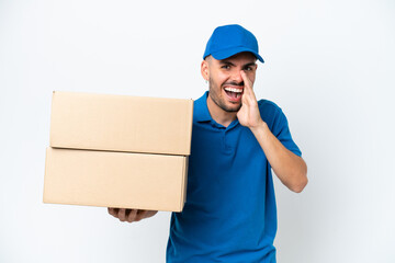 Delivery caucasian man isolated on white background shouting with mouth wide open