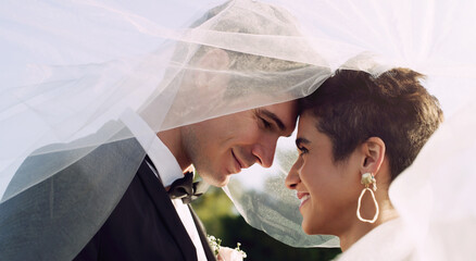 Wedding, veil and couple with forehead touching for marriage, commitment or ceremony celebration....