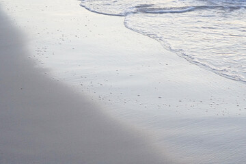 Beach waves on the the coast of sea with white sand beach at Sattahip Chonburi Thailand - Abstract Background Blue Nature 
