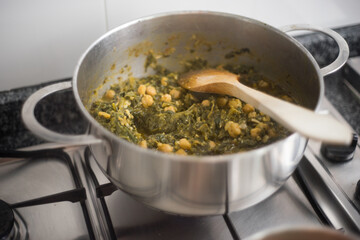 Spinach and Chickpea Stew Preparation in Seville