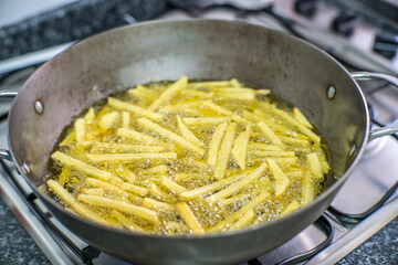 Frying Potatoes in Seville, Spain