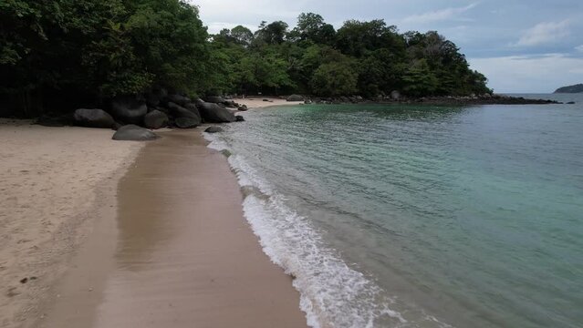Fligh on the shore of Paradise Beach in Phuket Thailand
