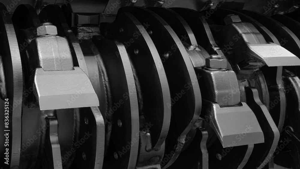 Aufkleber A close up of a machine with a black and silver color scheme