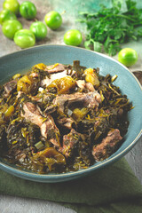 chakapuli, Georgian dish, stewed meat with herbs and tkemali, in white wine, homemade, no people,