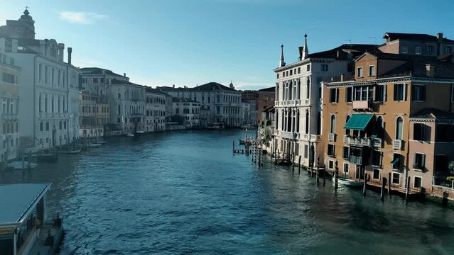 Romantic background Grand Canal in Venice in summer. Gandolas and ships. Italy.