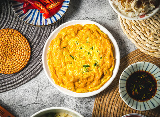 Fried scallions eggs omelet served in plate isolated on grey background top view of assorted taiwan food