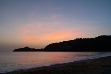 Sunset over the sea and the bay of Agios Georgios on the island of Corfu