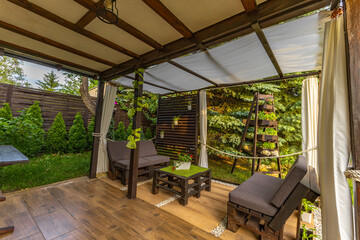 Garden terrace, resting place, flowers, wooden pergola