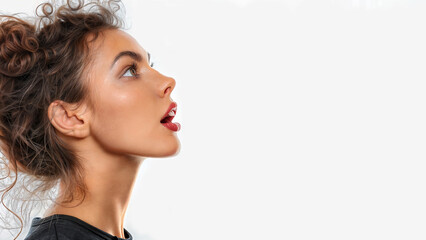 Close up profile of a young latino woman with mouth open wide, shouting. Isolated on white, copy space, aspect ratio 16:9