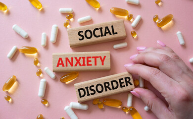 Social Anxiety Disorder symbol. Concept words Social Anxiety Disorder on wooden blocks. Beautiful...