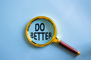 Do better symbol. Magnifying glass with words Do better. Beautiful blue background. Business and Do...