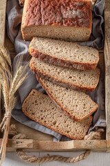 Tasty loaf of breads baked in home bakery.