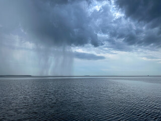 Rain falling over the Chesapeake Bay.