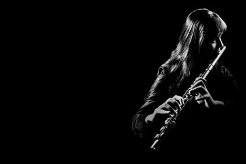 Flute player isolated. Flutist playing music instrument