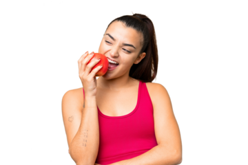 Young beauty woman over isolated chroma key background eating an apple