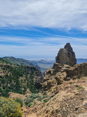 A canyon with a mountain in the background