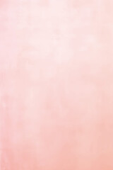 Fototapeta premium Pastel peach color blurred background. Abstract portrait backdrop for studio. Empty textured wall.