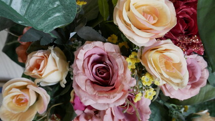 synthetic flowers that resemble real flowers for room decoration. Photo of a beautiful blooming flower plant taken in close-up and selected focus