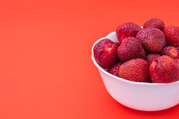 Delicious ripe strawberries on white plate, closeup