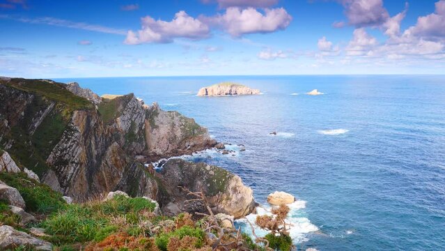 Seascape of Atlantic ocean and Asturias rocky coast at Cape Penas. Sea shore with high cliffs in north Spain.