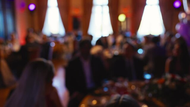 Captivating banquet event featuring guests at an opulent venue, highlighted in a stylish slow motion setting