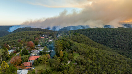 Drone aerial photograph of controlled bush fire hazard reduction burning by the Rural Fire Service in the Blue Mountains in NSW, Australia.