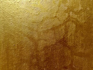 Gold cement wall texture background