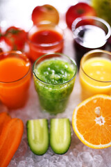 Glasses with fresh organic vegetable and fruit juices