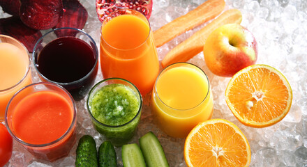Glasses with fresh organic vegetable and fruit juices