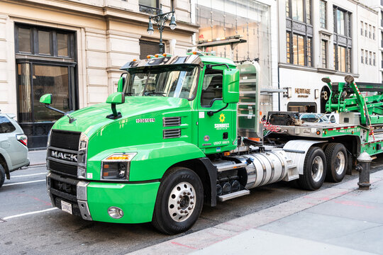 New York City, USA - March 26, 2024: Mack truck of pressure wash service parked outdoor, corner view