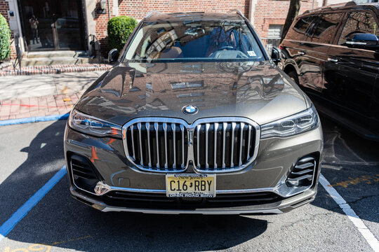 New York City, USA - March 31, 2024: BMW X7 modern grey car parked outdoor, top view