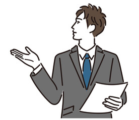 資料を説明するスーツの男性