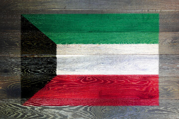 Kuwait flag on rustic old wood surface background