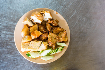 Snack and dessert served with cucumber slice and eating with sweet and sour spicy sauce.