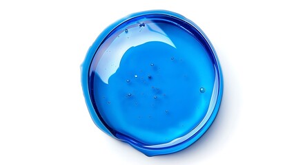 Perfectly round oil drop, vibrant blue, against a stark white background.