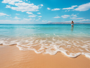 A Beach Scene At Sunset, With Pastel-colored Skies Reflecting On The Water 