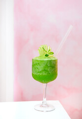 Mocktail made from green apple, mint, and lemonade with copy space