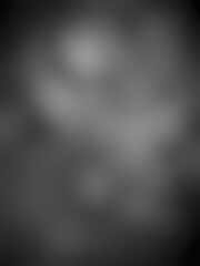 A black background with a white background,abstract black background with some smooth lines.black background vector illustration texture and dark gray charcoal paint, dark and gray abstract wallpaper.