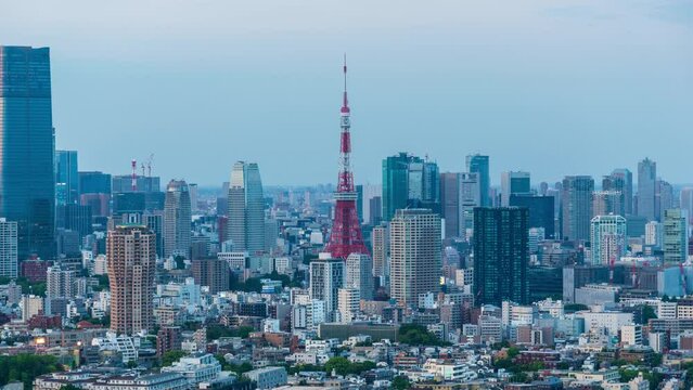 Time lapse day to night of downtown tokyo and tokyo tower. Evening cityscape, Japan tourist attractions or asia travel concept.
