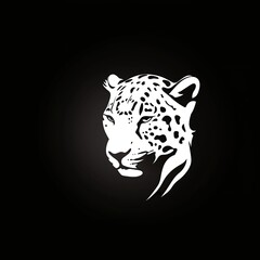 The logo of the head of a Jaguar, a Leopard on a black background. Wild cat emblem design. Vector illustration.